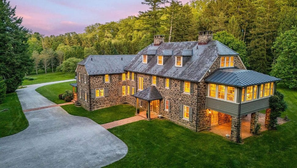 Exterior of stone Wayne estate.