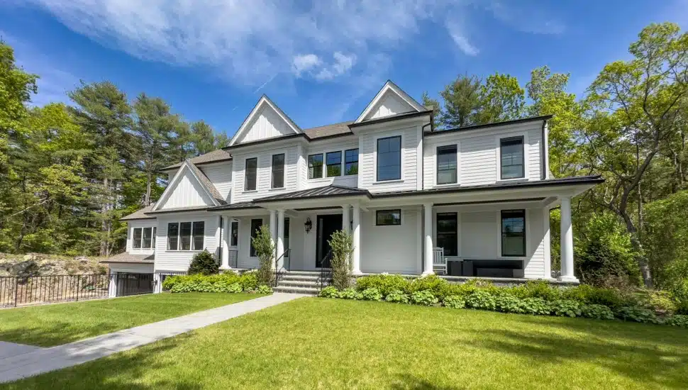 Contemporary farmhouse style suburban home on a sunny Spring morning.
