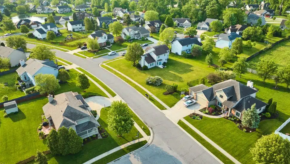 Aerial shot of middleclass homes in neighborhood.