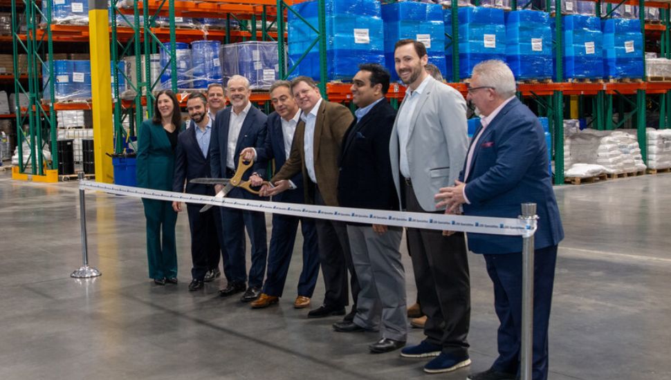 LBB Specialties senior leadership team cutting ribbon in new Bristol distribution center.