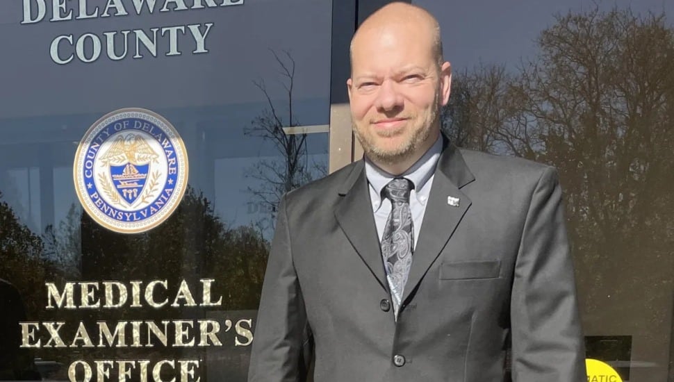 Jeffrey E. Lange standing in front of Delaware County Medical Examiner's building.