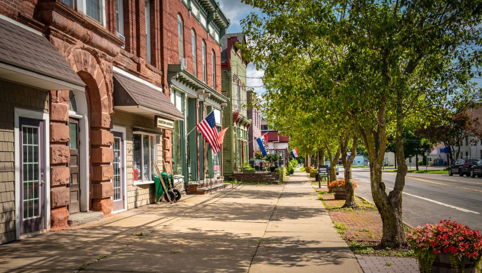 Storefronts on a summer day in a small town.