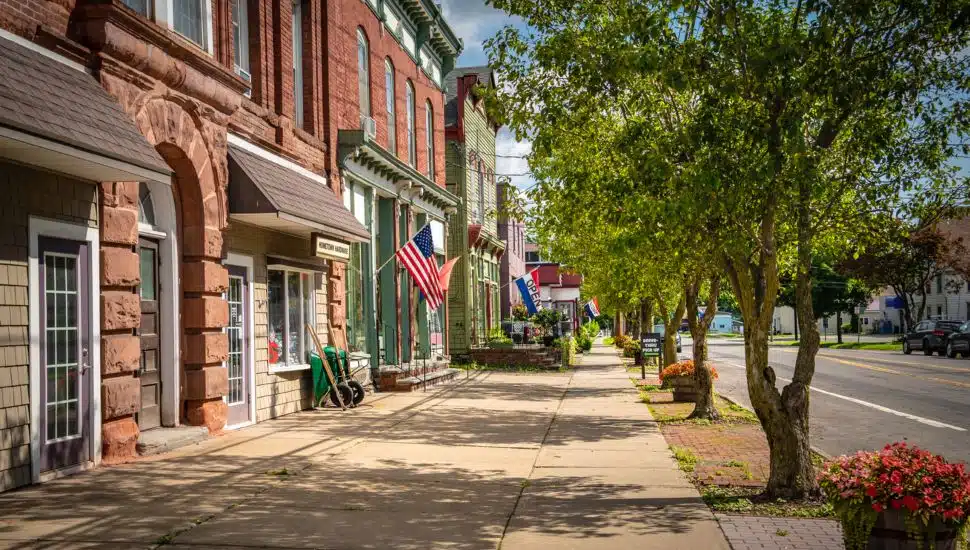 Storefronts on a summer day in a small town.