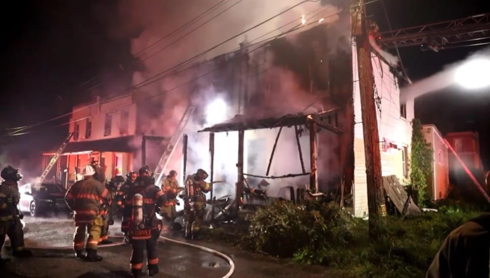 Firefighters putting out fire at Chester home.
