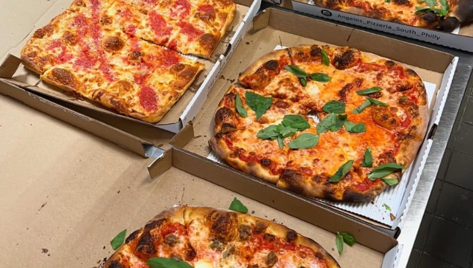 Pizza from Angelo's Pizzeria in boxes.