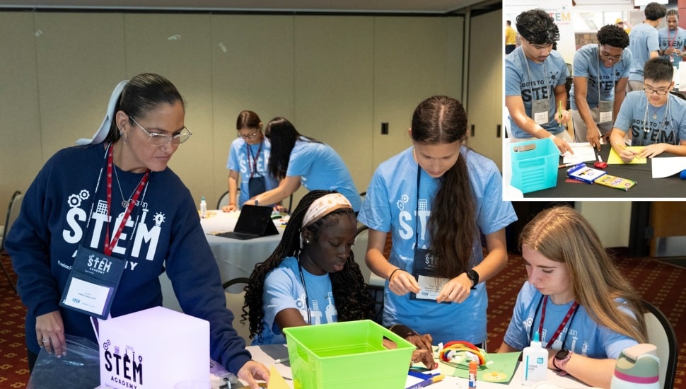 High school students participate in hands-on STEM learning.
