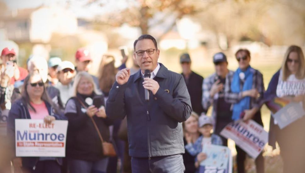 Josh Shapiro speaking in front of crowd.