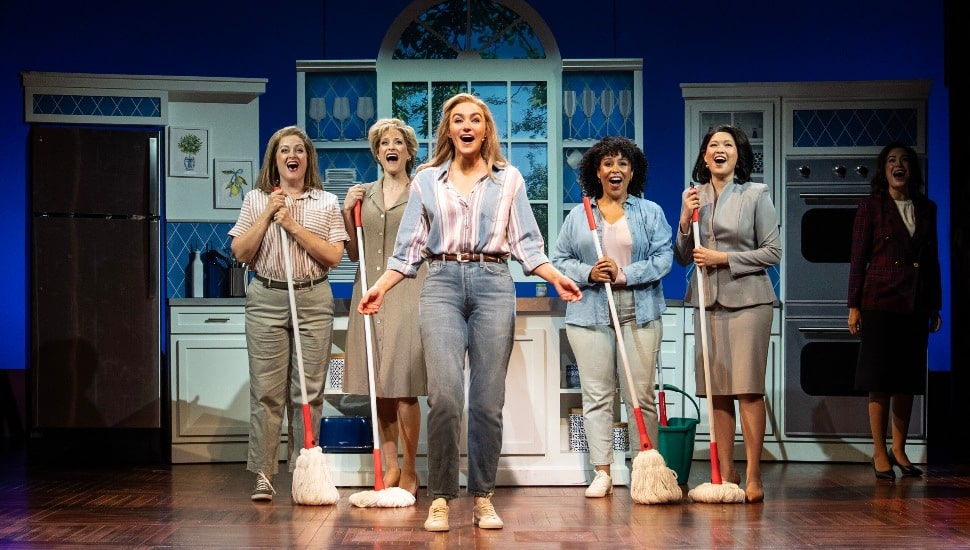 Cast members of Joy the Musical during a performance.