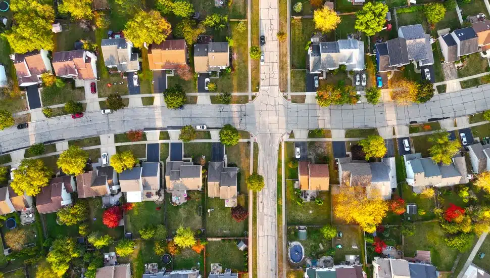 Aerial View of Suburban Neighborhood in Autumn.