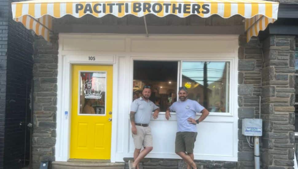 Chris and Frank Pacitti standing outside their new store.