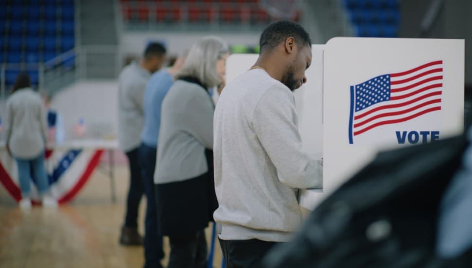 Voters at polls.