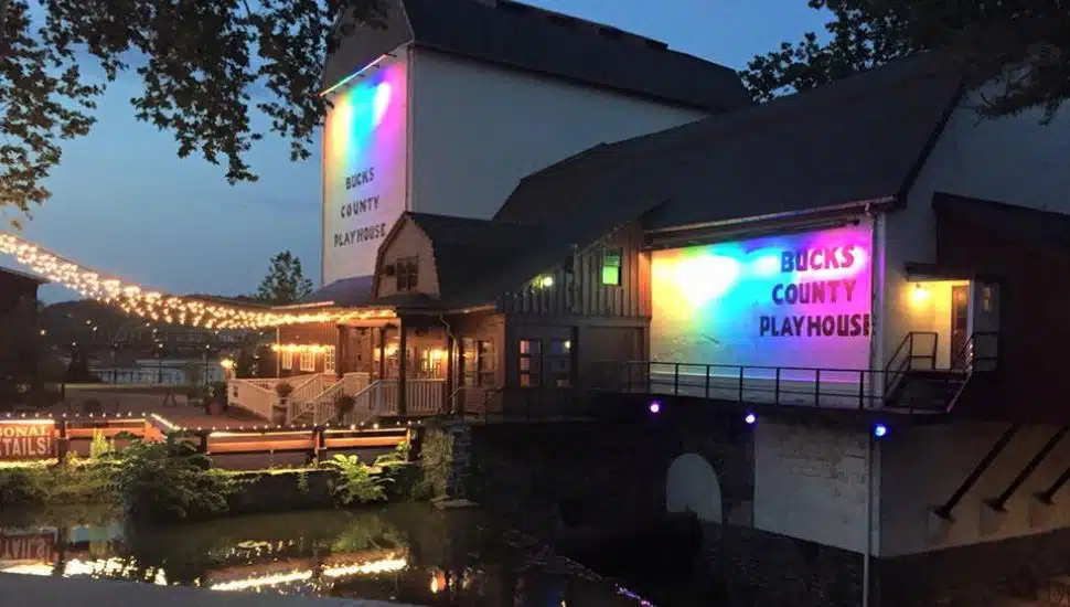 Bucks County Playhouse exterior at night with rainbow lights.