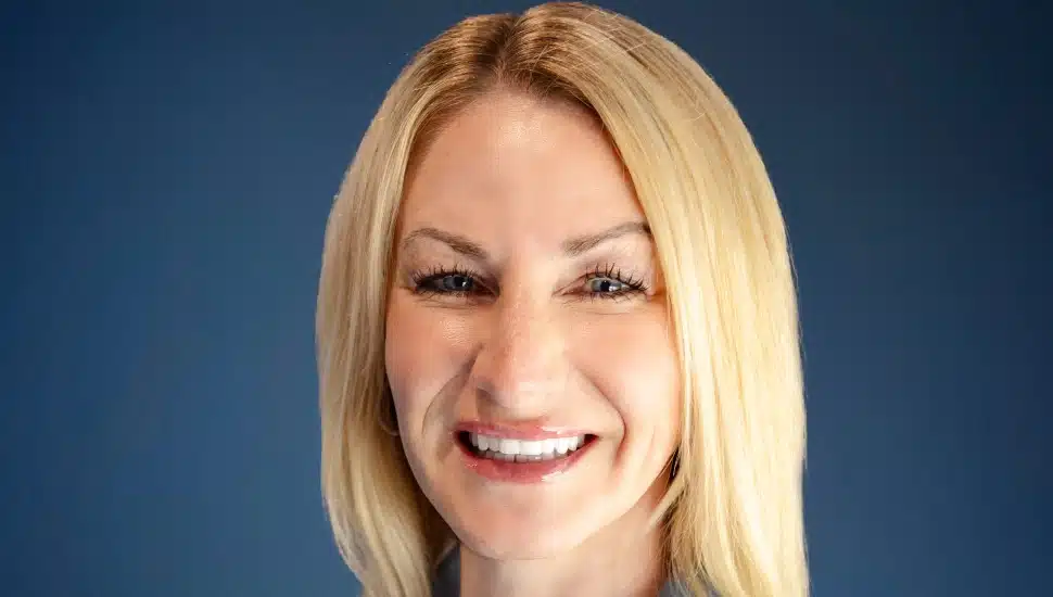 Headshot of middle-aged blond woman.