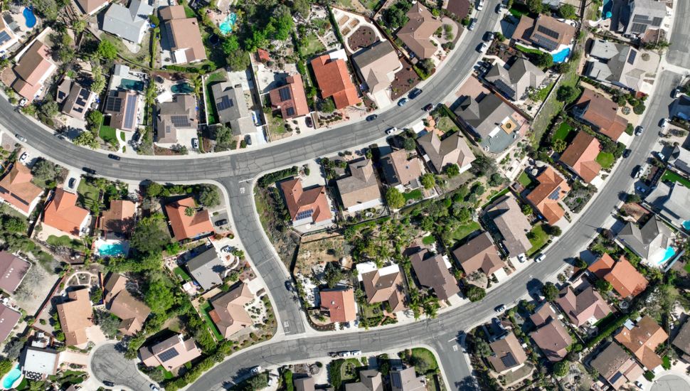 Aerial shot of suburban neighborhood.