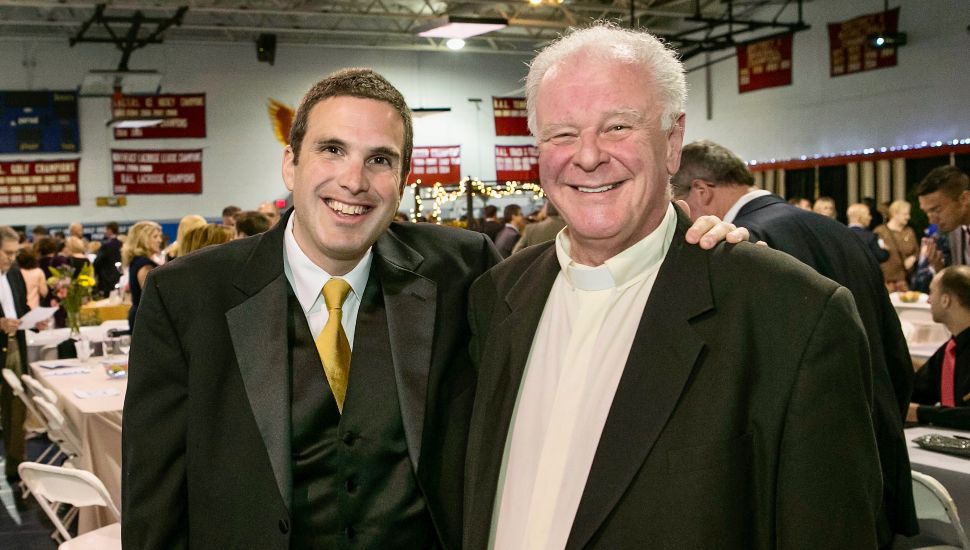 Ryan Abramson (left) and Fr. Chris McDermott (right).