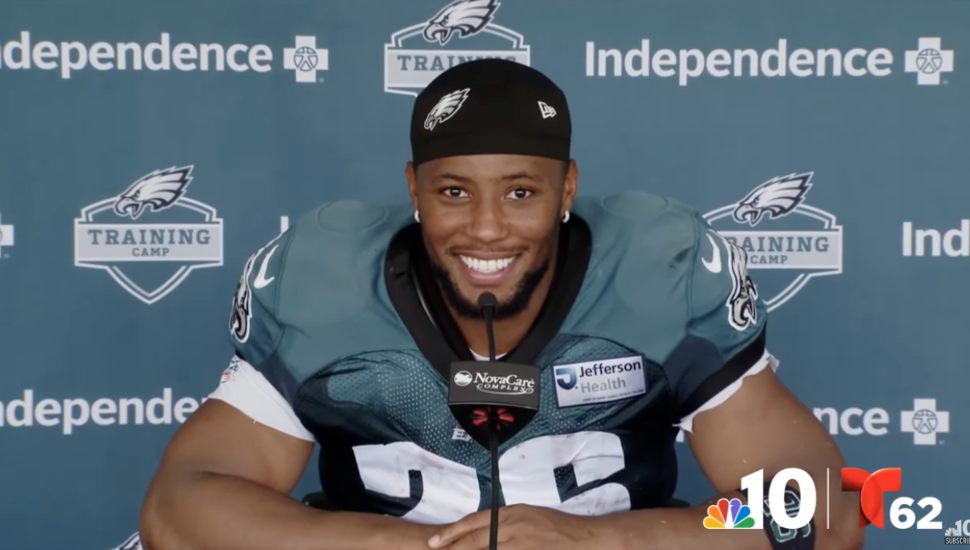 Saquon Barkley smiling during press conference.