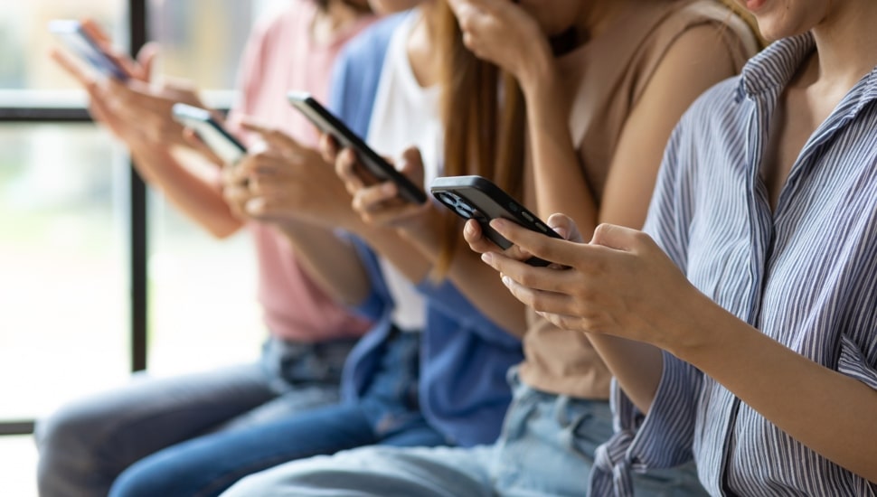 Students with cell phones.