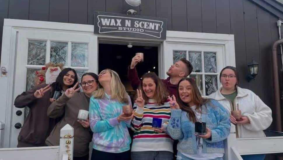 Group of women standing outside of Wax N Scent Studio.