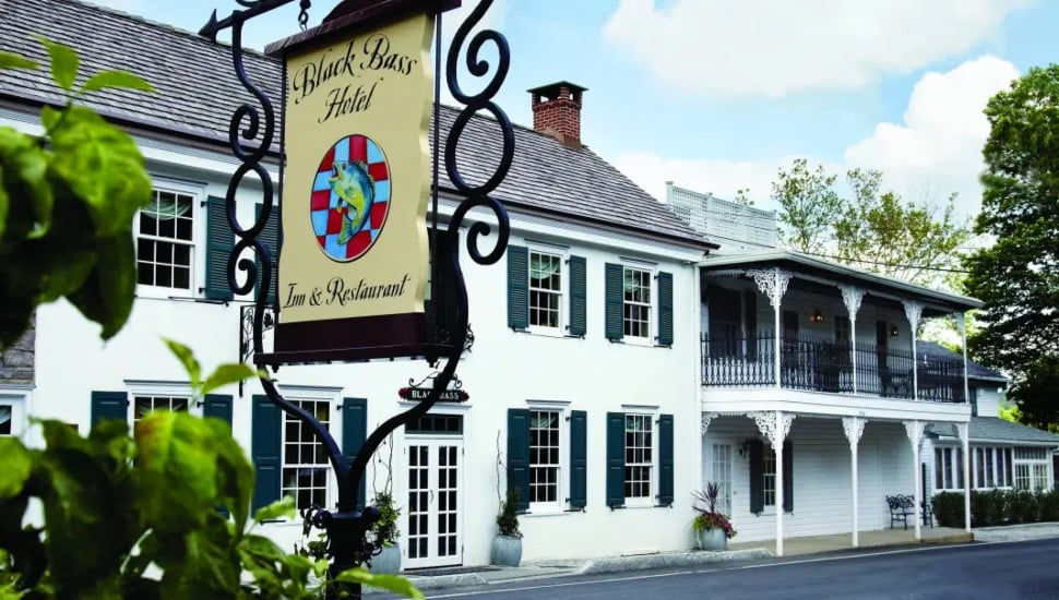 Black Bass Hotel sign and the building exterior.