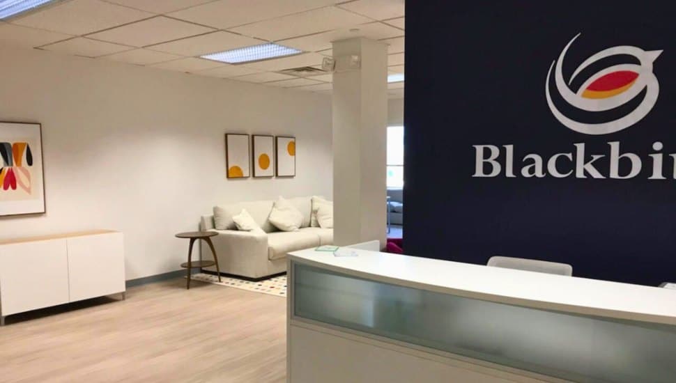 Help desk and waiting room at Blackbird Health.