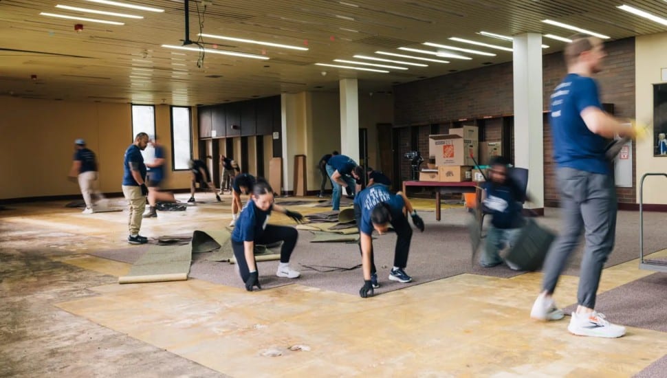 Power Home Remodeling employees help renovate the Chester High School library.