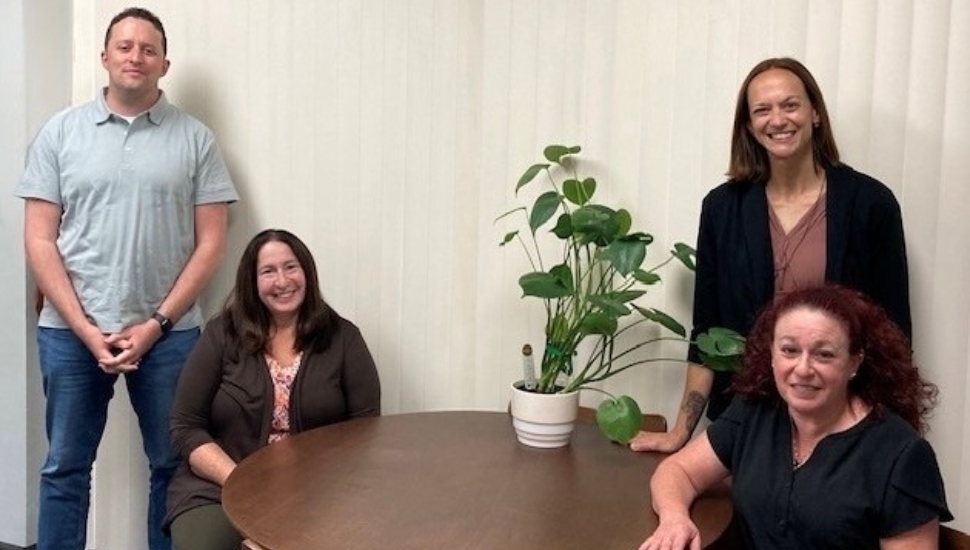 Four therapists at a roundtable.