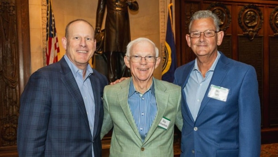 Bank's three most recent CEOs pose for group photo.