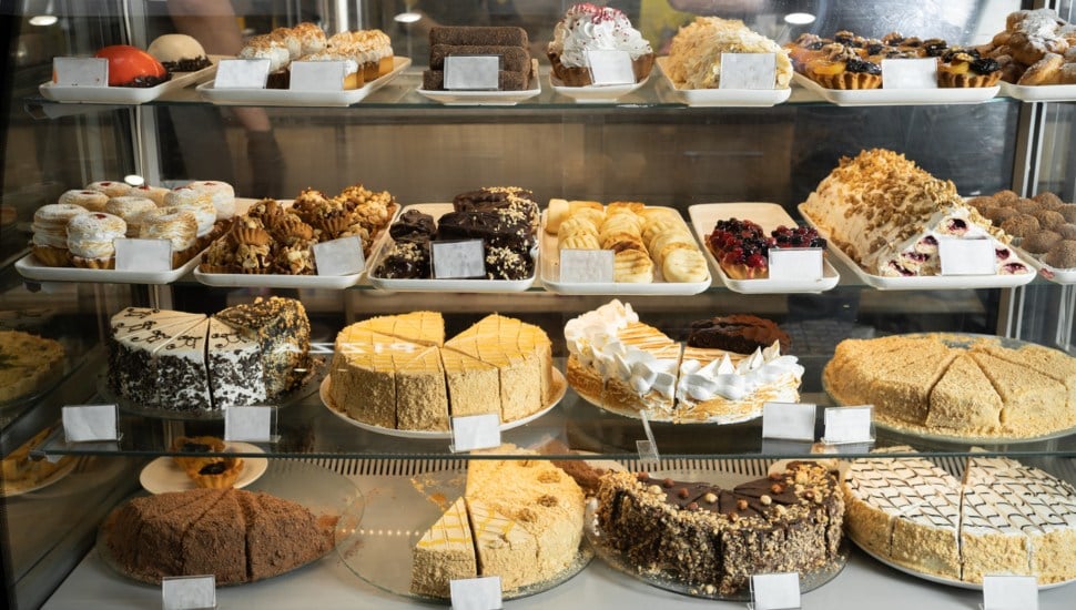 Desserts in a bakery display.