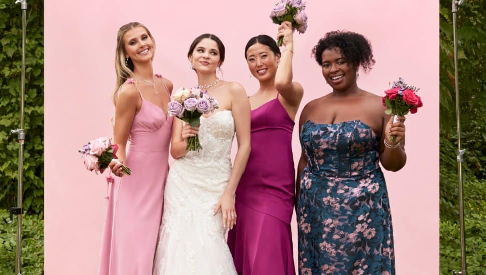 Models in David's Bridal wedding gowns and dresses.