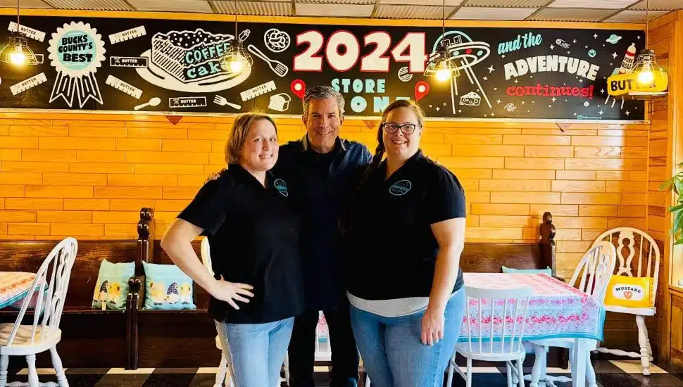 Angela Brachelli and Missy Bodine with Bob Kelly.