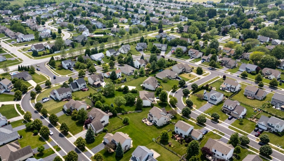Aerial shot of suburban neighborhood.