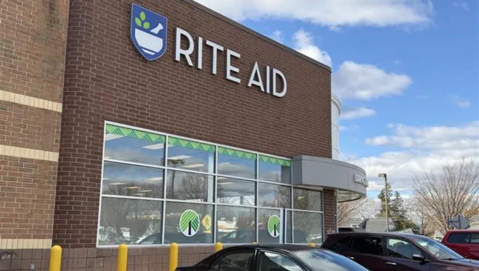 Levittown former Rite Aid with Dollar Tree signs in the windows.