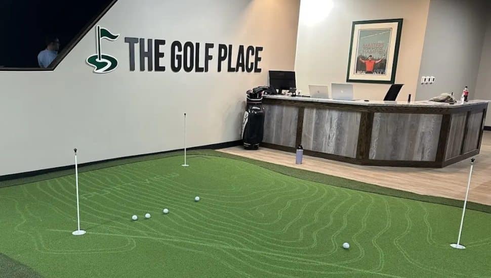 The Golf Place sign and front desk.