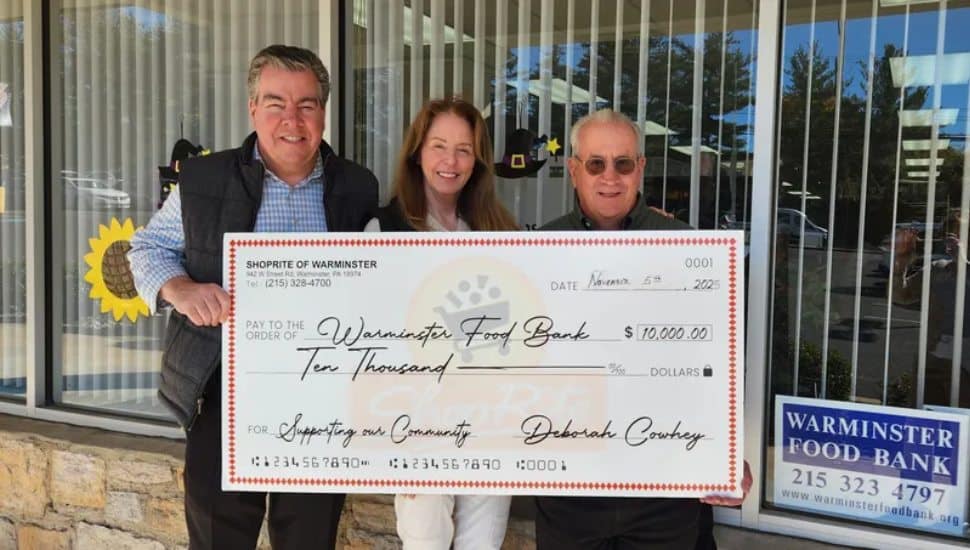 Warminster Food Bank staff with a check from ShopRite.