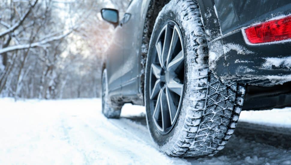 Car driving in snow.