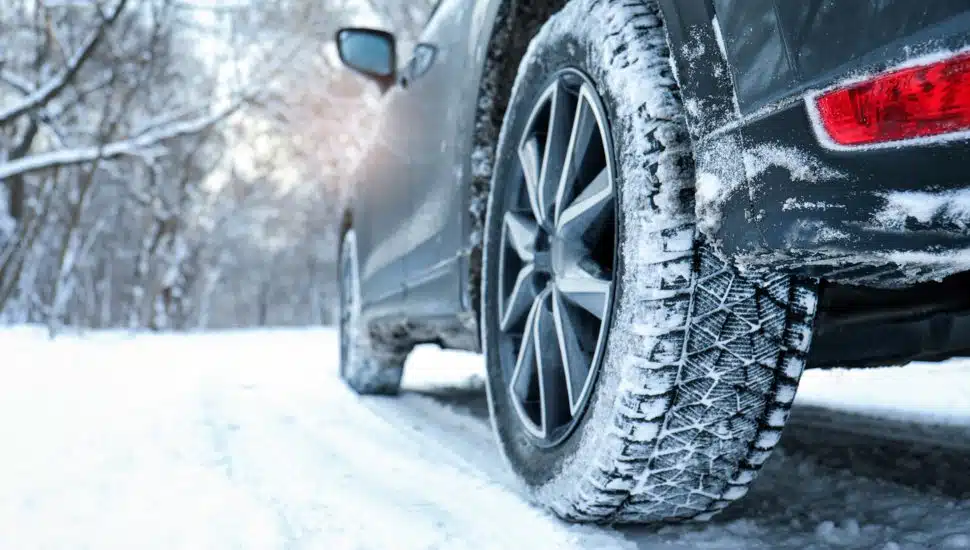Car driving in snow.