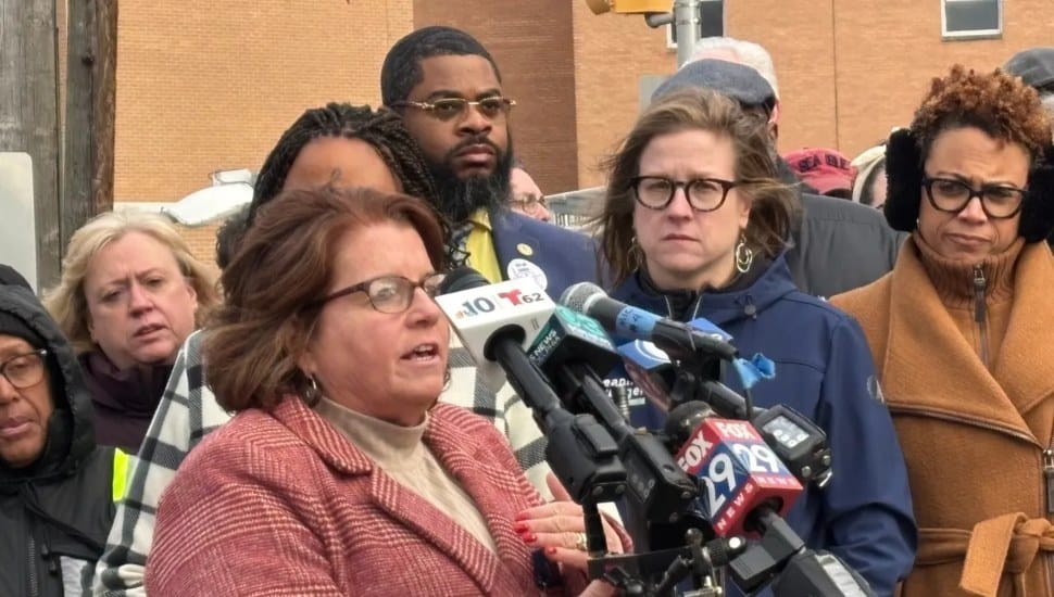 Peggy Malone, president of the Crozer-Chester Nurses Association, speaks at a gathering about the impact of the hospital closings on staff and patients.