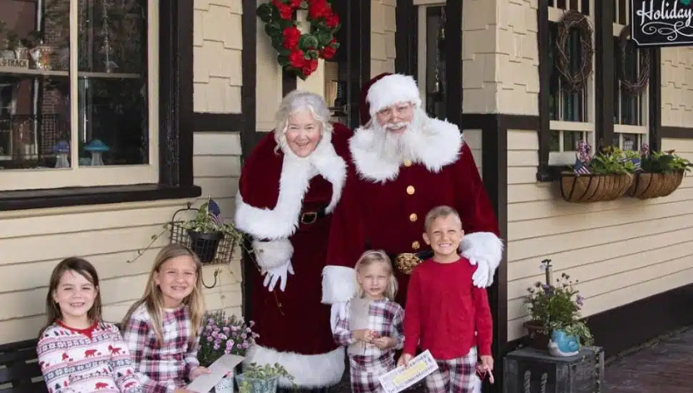 Mrs. and Mrs. Claus with kids at New Hope Railroad station.