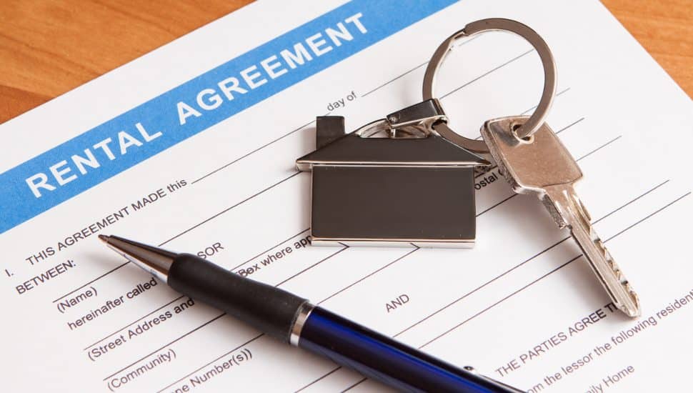 Close up of lease agreement empty document with pen.
