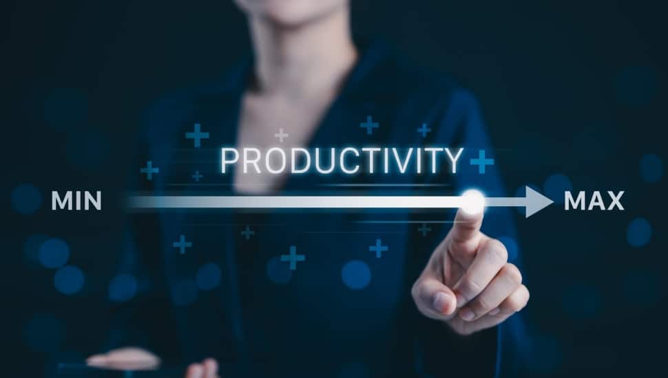 Businesswoman adjusting virtual slider from min to max to increase productivity.