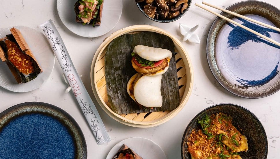 Dishes from Anzu Social with chopsticks.