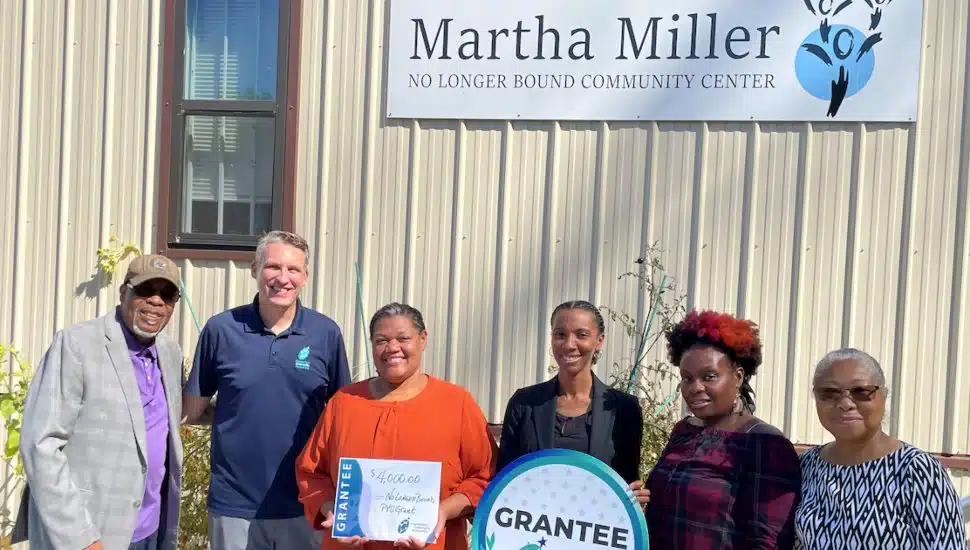 Foundations Community Partnership’s CEO Dr. Tobi Bruhn (second from left) awarded a Partnership in Youth Services Grant to the No Longer Bound team to help educate and prepare youth to become community leaders by empowering them to foster transparent dialogue and nonviolent resolutions in their community.