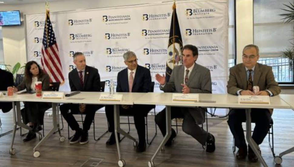 Dr. Chari Cohen, Rep. Brian Fitzpatrick, Dr. Jay Bhattacharya, CEO Lou Kassa and Dr. Ju-Tao Guo sitting at a table.