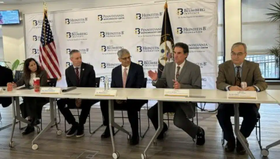Dr. Chari Cohen, Rep. Brian Fitzpatrick, Dr. Jay Bhattacharya, CEO Lou Kassa and Dr. Ju-Tao Guo sitting at a table.