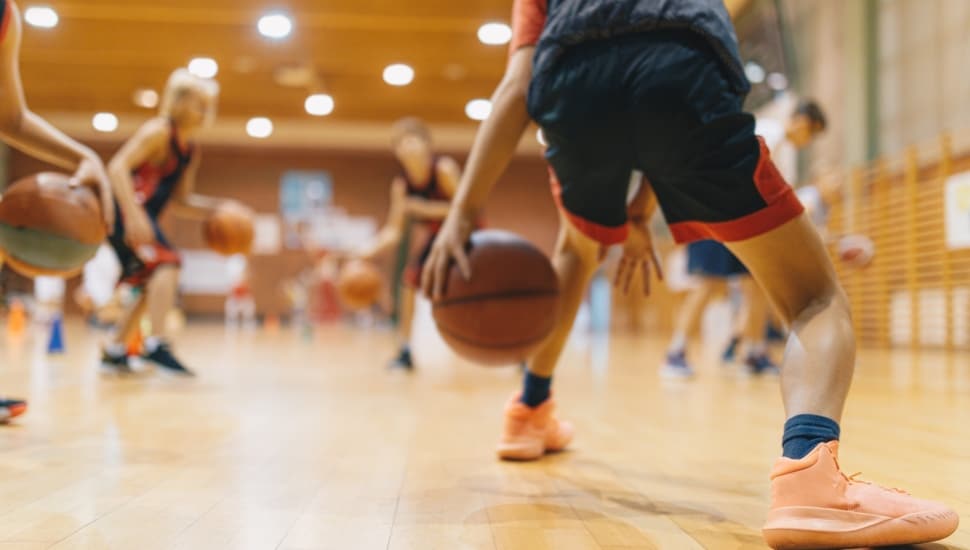 basketball players on the court.