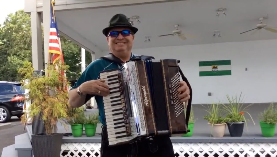 Don Bitterlich playing accordion.