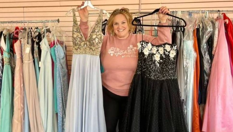 Kelly Laustsen with prom dresses.