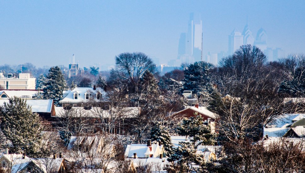 Philadelphia suburbs with skyline in background.