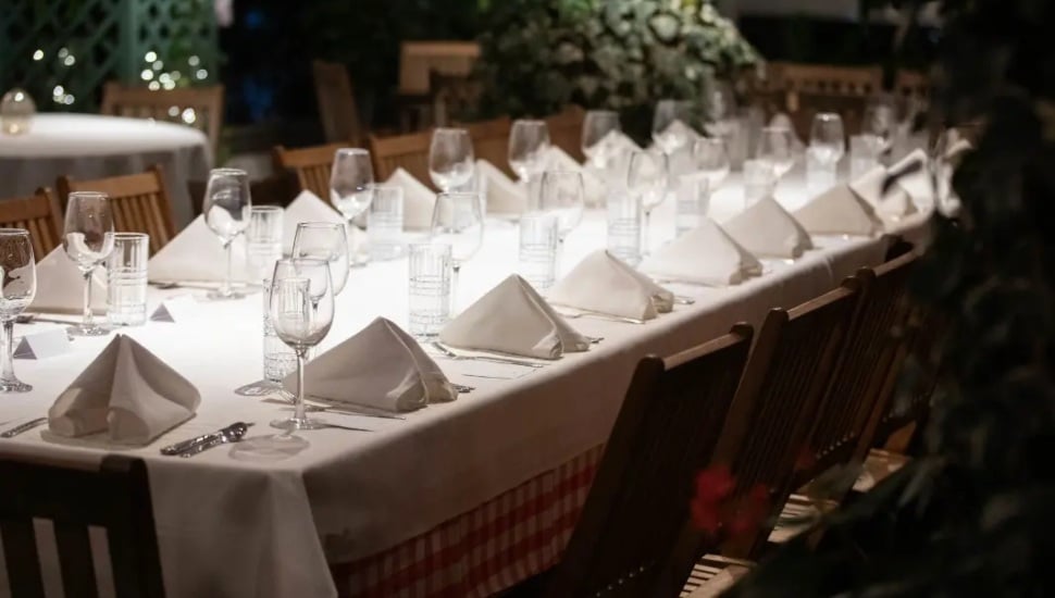 Table with napkins and glasses.