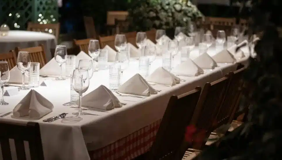Table with napkins and glasses.